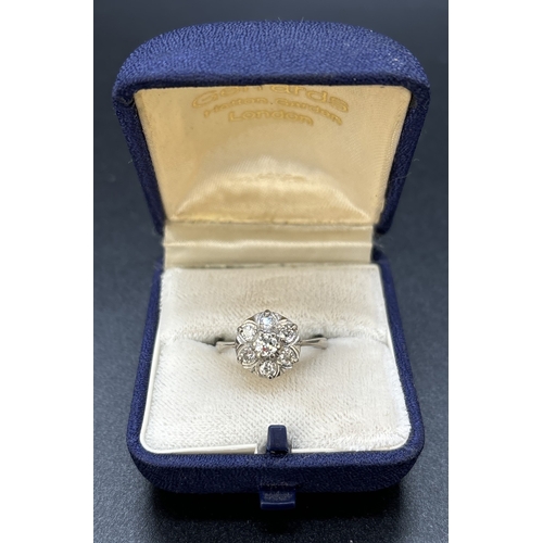 108 - A vintage 18ct gold diamond cluster ring. 7 round cut diamonds total diamond weight approx .50ct. Ra... 