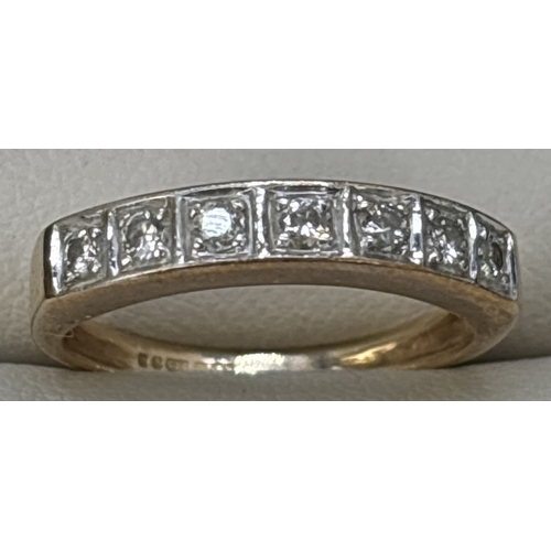 109 - A 9ct gold diamond set half eternity ring, square illusion setting with 7 round cut diamonds. Hallma... 