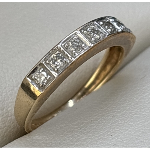 109 - A 9ct gold diamond set half eternity ring, square illusion setting with 7 round cut diamonds. Hallma... 