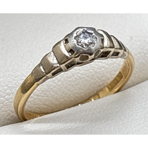 1056 - A vintage 18ct gold diamond solitaire ring with stepped design mount. Fully hallmarked inside band. ... 