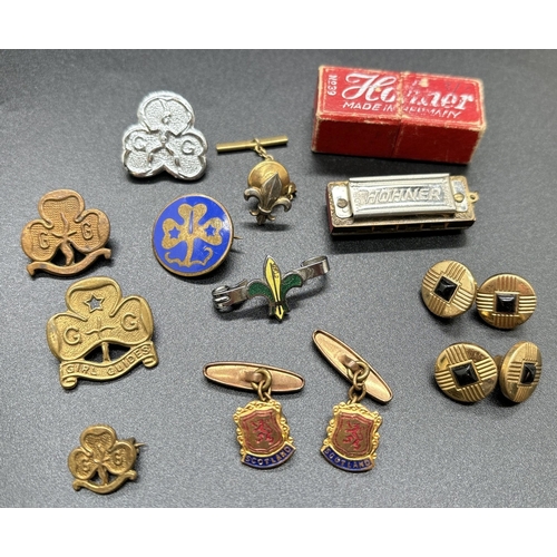 1379 - A small collection of assorted vintage badges & cufflinks together with a boxed miniature Hohner har... 