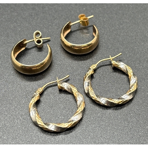 1041 - 2 pairs of 9ct gold hoop style earrings. A pair of duo coloured gold twist design hoops together wit... 