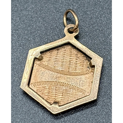 1052 - A vintage 14ct Austrian gold hexagonal reversible pendant. Empty cartouche to one side with engraved... 