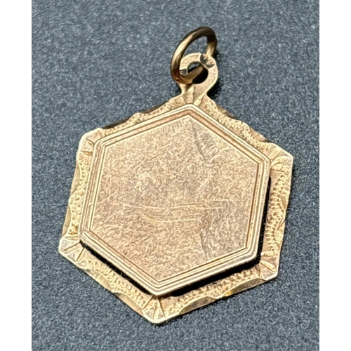 1052 - A vintage 14ct Austrian gold hexagonal reversible pendant. Empty cartouche to one side with engraved... 