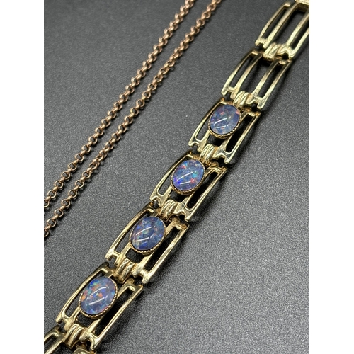 1092 - A silver gilt bar style bracelet set with oval opalite stones together with a silver gilt flower pen... 