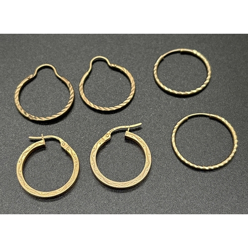 1102 - 3 pairs of gold hoop style earrings. 2 pairs with diamond cut pattern to one side, unmarked but test... 