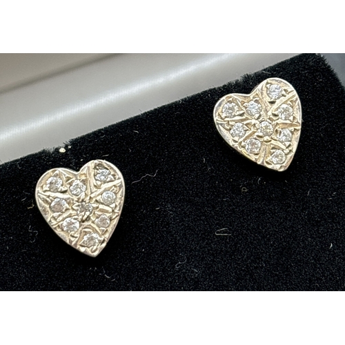 1109 - 6 pairs of silver and white metal stud style earrings. To include 4 pairs of heart shaped earrings, ... 