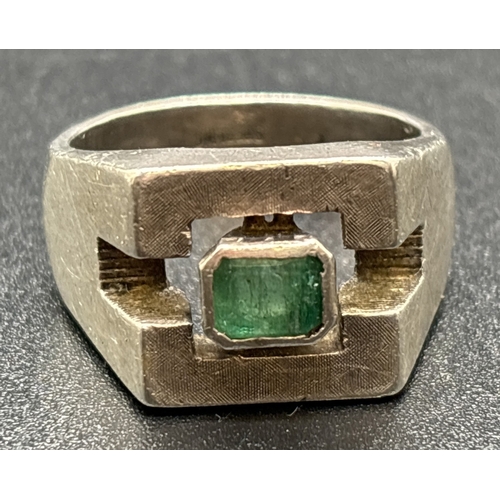 1111 - A silver contemporary design geometric style signet ring set with a square cut emerald. Silver marks... 