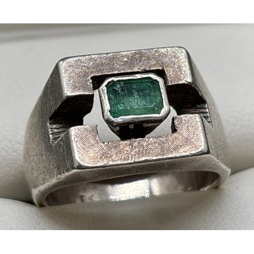 1111 - A silver contemporary design geometric style signet ring set with a square cut emerald. Silver marks... 