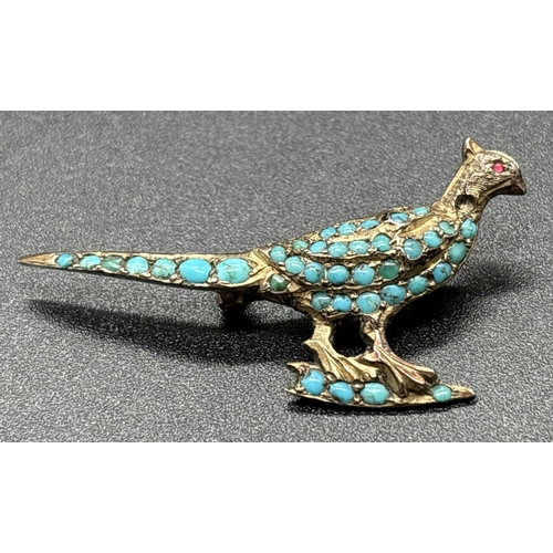 1119 - An antique gold brooch modelled as a pheasant with pave set turquoise cabochons (1 missing) and smal... 