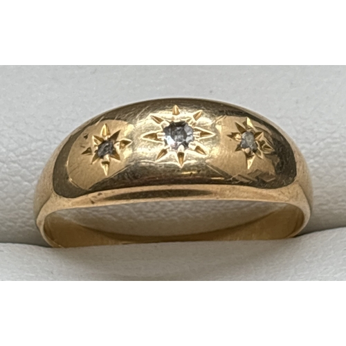 1120 - A vintage 18ct gold dome top diamond set gypsy style ring. 3 small round cut diamonds set to top of ... 