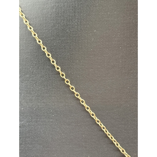 1130 - A 9ct gold plain cross pendant on a 16 inch belcher chain with spring ring clasp. Gold marks to pend... 