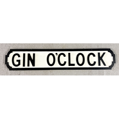 1382 - A modern painted wood 'Gin O' Clock' sign, in the style of an old street sign. Approx. 70cm long.