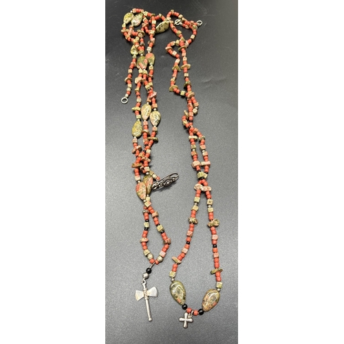 1132 - 2 jasper and coral beaded necklaces. A 44 inch jasper and coral bead necklace with silver hook and e... 