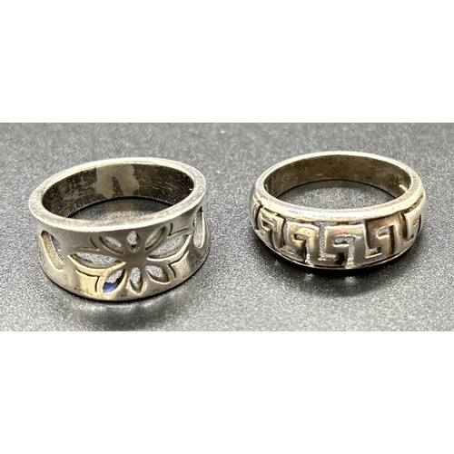 1151 - 2 pierced work design silver band rings, a floral and heart design together with a Greek key design.... 