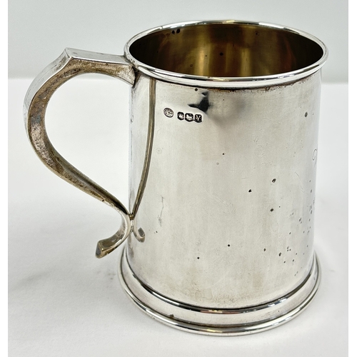 A vintage silver tankard from Whitbread & Co Limited, given in ...