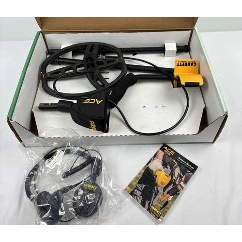 1397 - A boxed Garrett Ace 400i Advanced Metal Detector. In used unassembled condition. Comes with instrcti... 