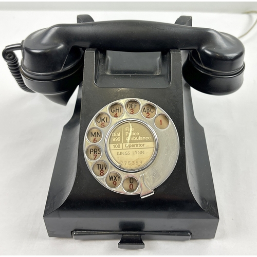 1400 - A vintage black bakelite GPO rotary telephone 164 48 with coil handset cord and pull out index plate... 