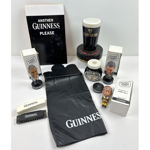 1356 - A collection of assorted Guinness related items to include a vintage light up bar pump front (approx... 