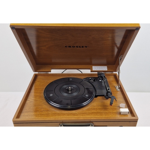 1370 - Crosley 1189986 Record/Radio/CD/Cassette player with built in speakers in a light wood finish. CD pl... 