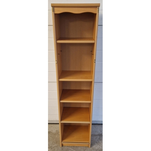 1438 - A modern wooden pine effect slim shelving unit with 3 adjustable shelves and shaped top. Approx. 138... 