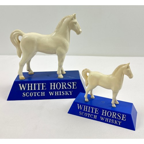 2 vintage White Horse Whiskey bar advertising plastic models. Largest approx. 22.5cm tall.