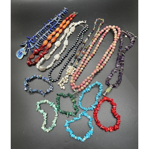 1084 - A collection of natural semi precious stone and freshwater pearl jewellery necklaces and bracelets. ... 