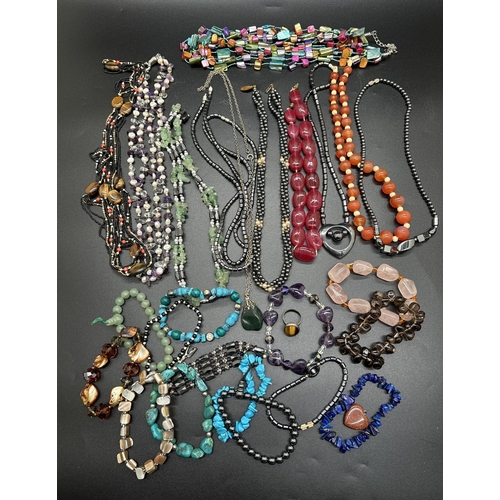 1127 - A box of natural stone jewellery necklaces and bracelets, pendants and a ring. Stones include smoked... 