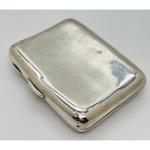 1224 - A late Victorian curve backed cigarette case with engraved monogram detail. Fully hallmarked to both... 