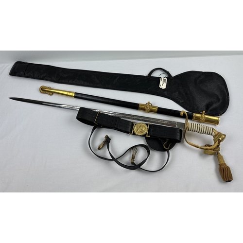 1263 - A post 1960 US Naval Officers ceremonial sword with scabbard, carry case and dress belt, by Wolf-Bro... 