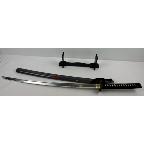 1265 - A handmade Rising Sun Lone Warrior Katana Samurai sword. 72cm curved blade with wire brush hamon. Gr... 