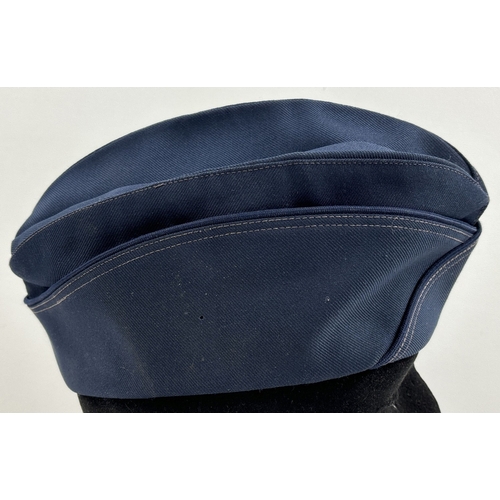 1266 - A vintage Kingform, New York, side cap in Navy blue with double stitched seams. Size 23.