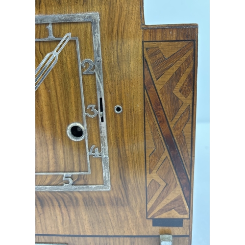 1268 - An Art Deco wooden cased westminster chime mantle clock with stepped design and inlaid panels. Pierc... 