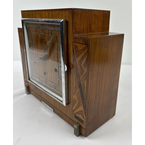 1268 - An Art Deco wooden cased westminster chime mantle clock with stepped design and inlaid panels. Pierc... 