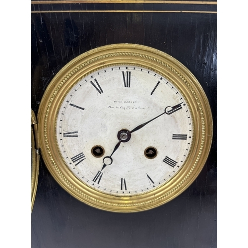 1269 - An dark wooden cased Victorian striking mantle clock with brass inlay detail, by Robert Henry Rue De... 