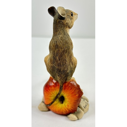 1283 - A Border Fine Arts figure of a field mouse sat eating on an apple core. Makers label to underside. F... 