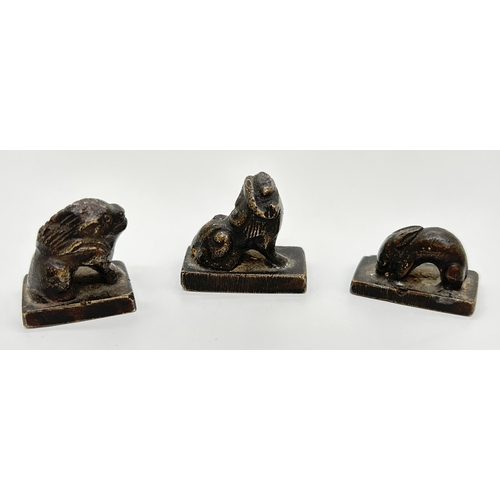 1296 - 3 early 20th century Chinese bronze miniature seals with handles modelled as mythical creatures. Lar... 