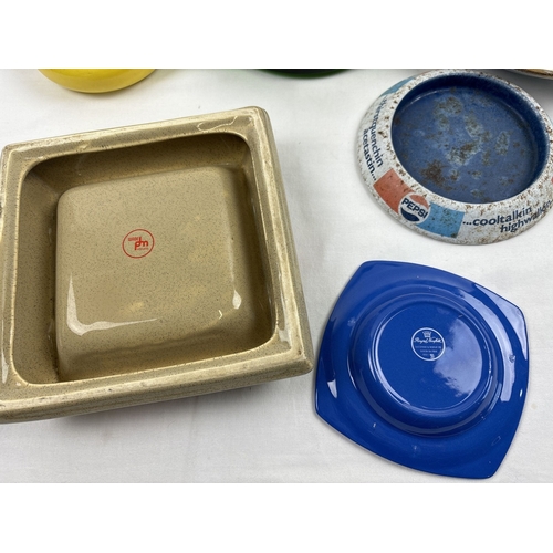 1316 - 9 assorted alcohol, brewery and soft drink advertising ashtrays, in ceramic, glass & metal. To inclu... 