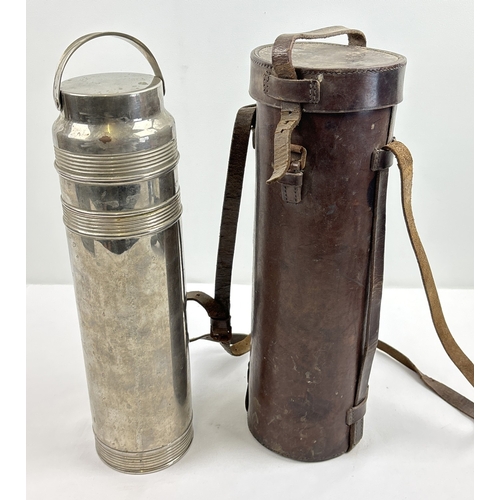 1388 - An early 20th century chrome Thermos vacuum flask in brown leather carry case with strap. Flask mark... 