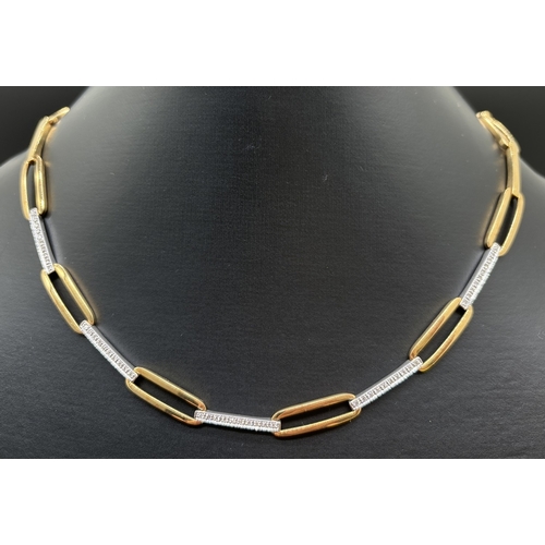 1041 - A 16 inch 18ct white and yellow gold alternating oval and flat link diamond set collar style necklac... 