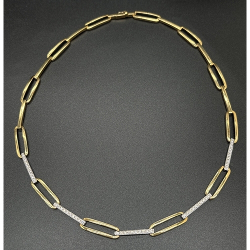 1041 - A 16 inch 18ct white and yellow gold alternating oval and flat link diamond set collar style necklac... 