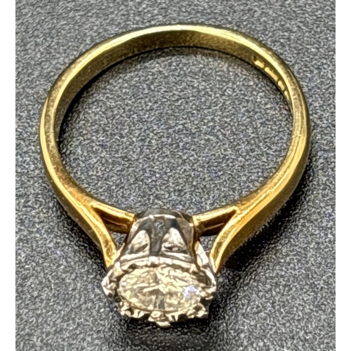 1060 - A .50ct diamond solitaire ring set in 18ct yellow gold. Stone set in pierced work decorative mount w... 