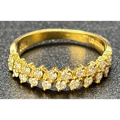 1092 - An 18ct yellow gold half eternity ring with 2 offset rows of small brilliant cut diamonds with a tot... 