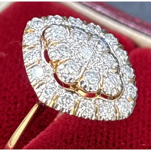 1081 - A 9ct yellow gold marquise shaped diamond ring comprising a central raised panel set with 9 x 0.04ct... 