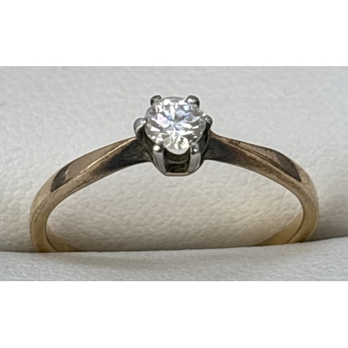 1093 - A vintage 18ct gold and platinum 0.15ct diamond solitaire ring. Inside of band stamped 18ct Plat. Si... 