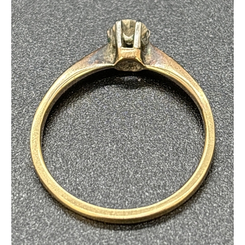 1093 - A vintage 18ct gold and platinum 0.15ct diamond solitaire ring. Inside of band stamped 18ct Plat. Si... 