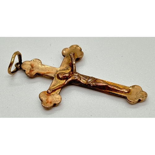 1068 - A vintage 9ct gold crucifix pendant for scrap or repair. Gold marks to back. Split to gold down one ... 