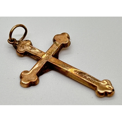 1068 - A vintage 9ct gold crucifix pendant for scrap or repair. Gold marks to back. Split to gold down one ... 