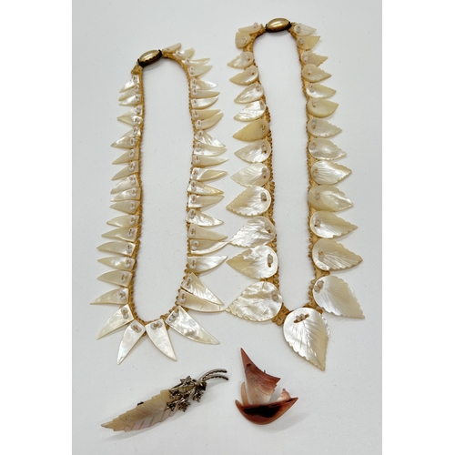 1096 - 4 pieces of vintage carved mother of pearl jewellery. A leaf brooch, a 16