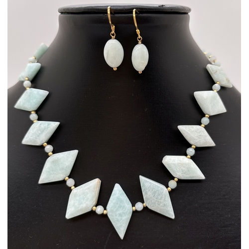 1107 - A round and diamond shaped amazonite bead necklace with matching oval drop earrings. Both with silve... 